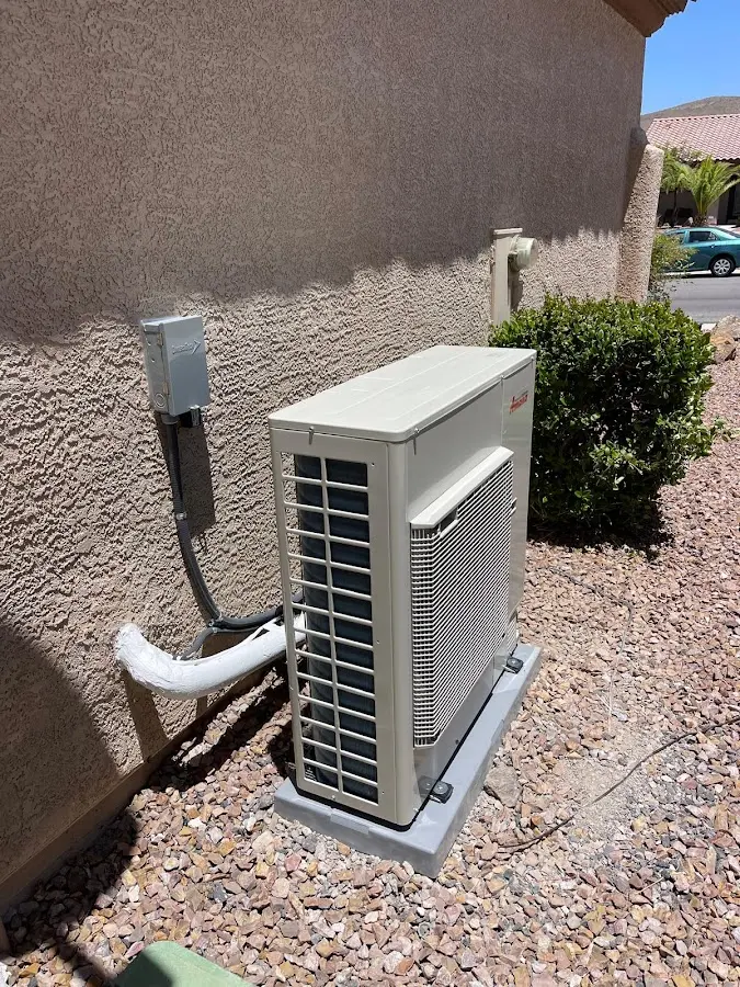 Residential air conditioning condenser unit in Douglas